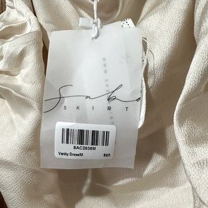 vanity dress new with tags nude/white color size medium